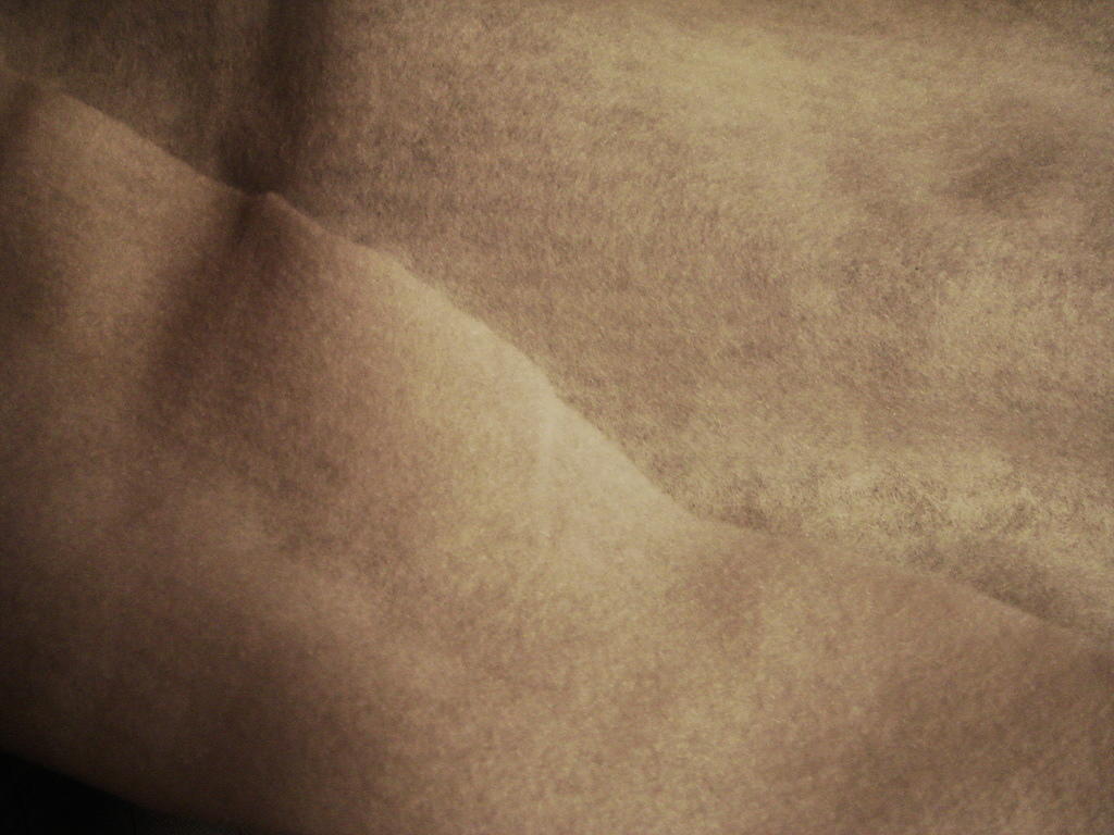 Seuraavaksi tulee hengityskangas (breather fabric), mikä puolestaan on vain halpaa huokoista kangasta, joka antaa ilman liikkua