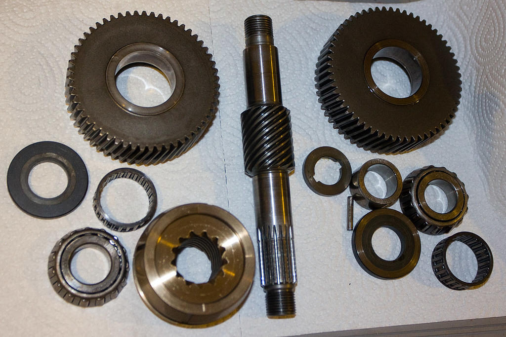 Both gears, drive cone, collars, shifter, nuts and seals are new; shaft, pin, bearings and their inner races are old.

All par