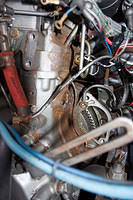I could not remove the sacrificing anode - bolt heads were rounded. On the photo: alternator and starter are removed, anode bolt