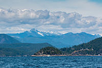 Sunshine Coast as is - seascape, mountainscape, sun, clouds. Entrance to Agamamnon Channel ahead.