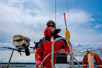 Masha takes advantage of a sailing jacket on a sunny summer day.